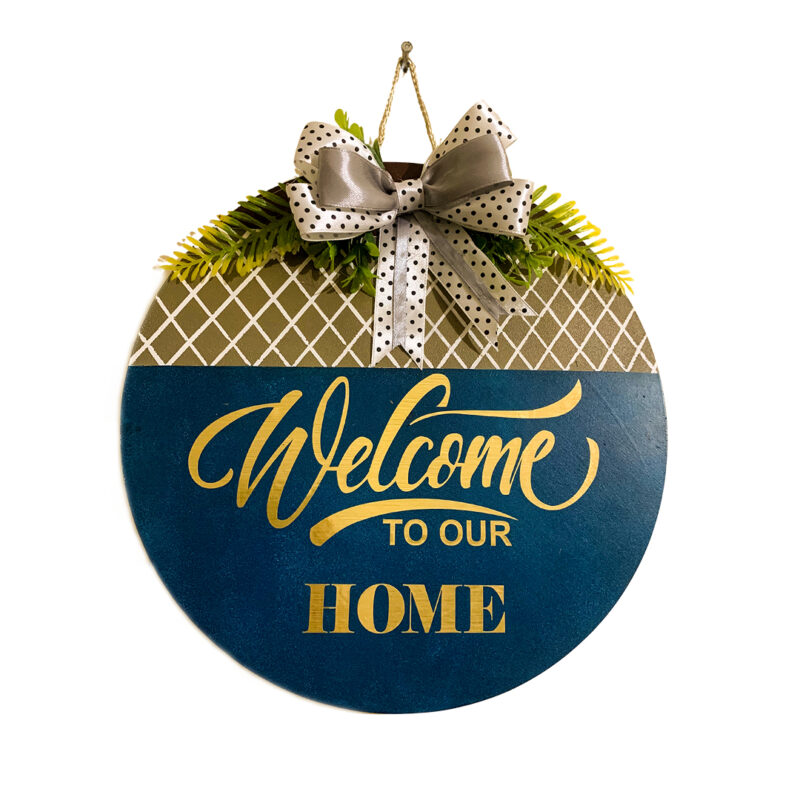 Welcome sign for front door porch made of MDF wood with acrylic paint vinyl lettering and artificial flowers