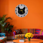 Modern cat wall clock displayed in stylish living room