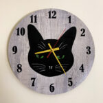 Modern cat wall clock made of MDF wood with minimalist design