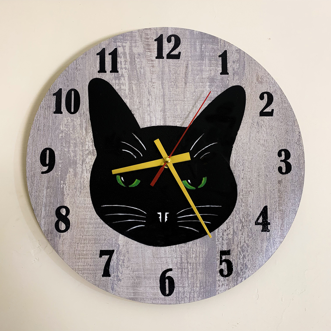 Modern cat wall clock made of MDF wood with minimalist design