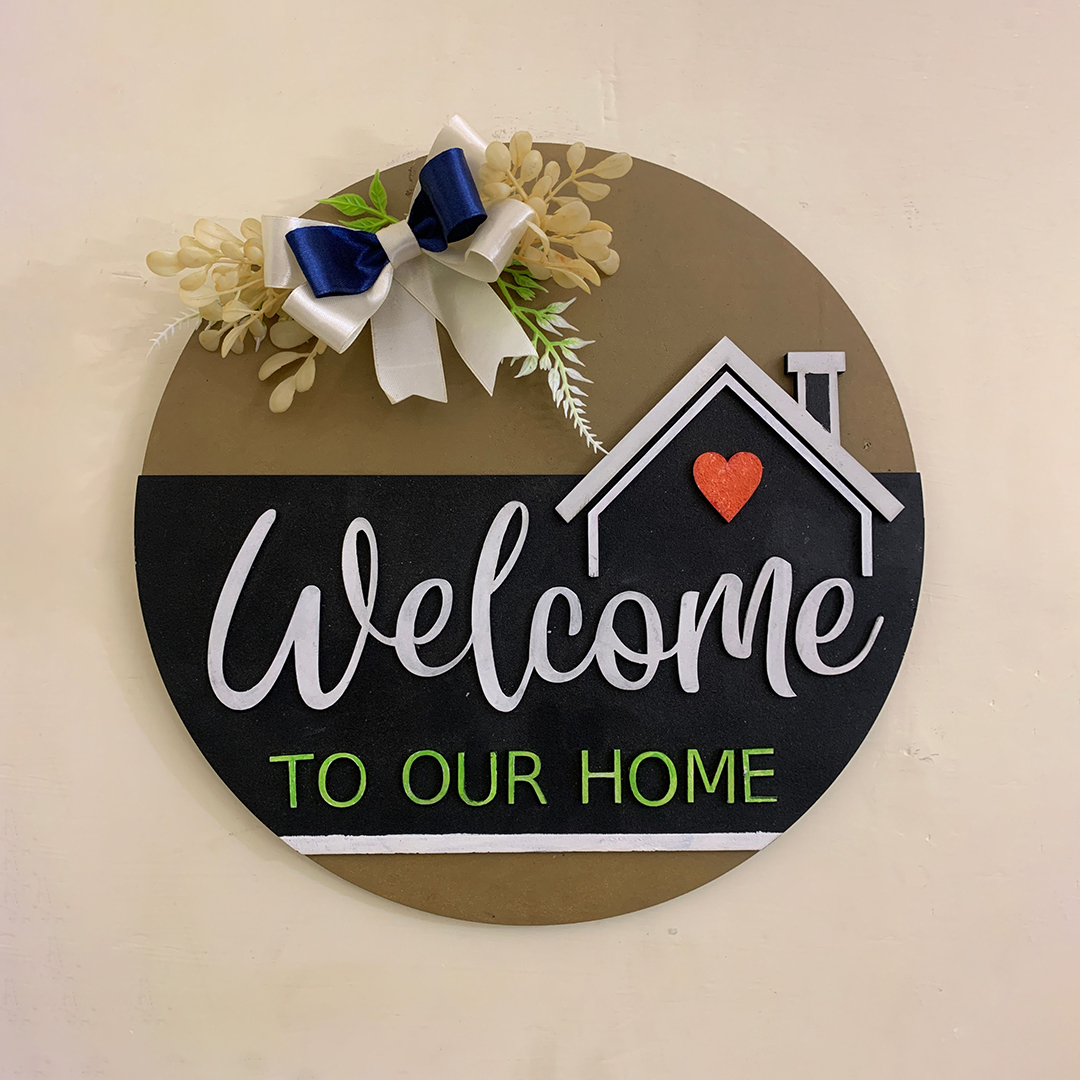 Welcome to Our Home Wooden Front Door Sign with floral decoration