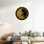 Front view of luxury golden and black acrylic mirror wall clock