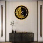Close-up laser engraved detailing on acrylic mirror wall clock