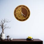 Close-up laser engraved detailing on acrylic mirror wall clock